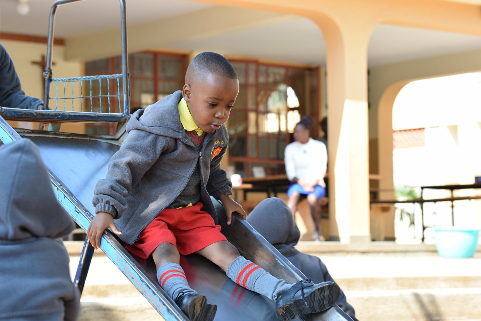 Students play in the playground at Holy Cross Academy in Lavington - Kenya
